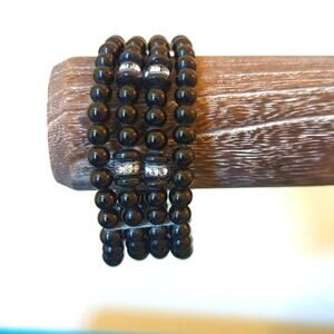 Vintage Four Strand Jet Black Glass Bead Coil Memory Wrap Mourning Bracelet